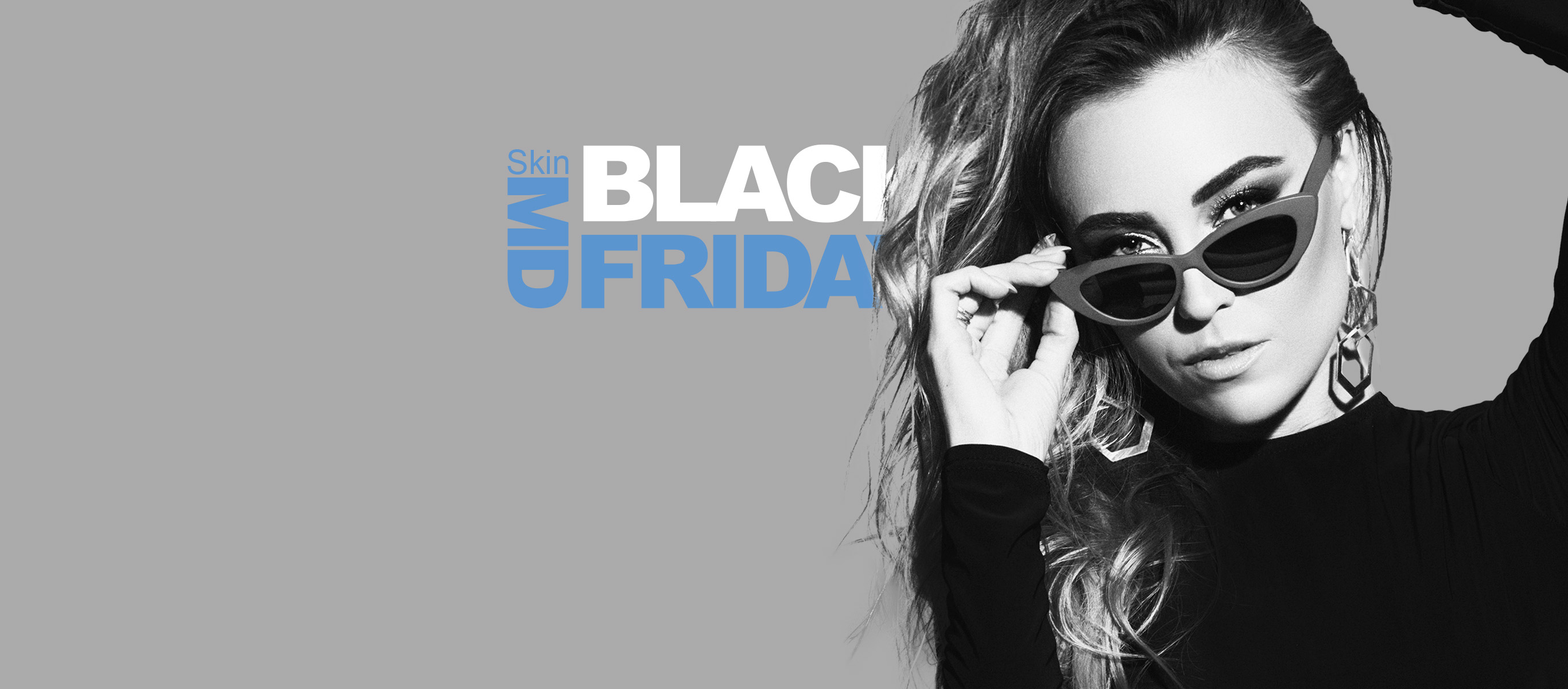 Photo of a woman wearing sunglasses with Skin MD Black Friday text