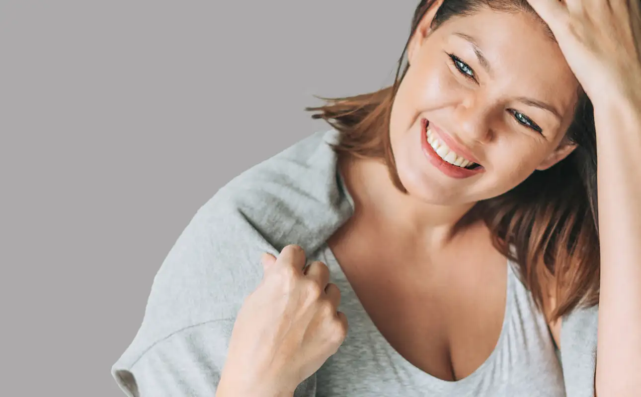 Brunette woman winking