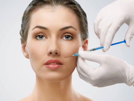 woman getting injection in face